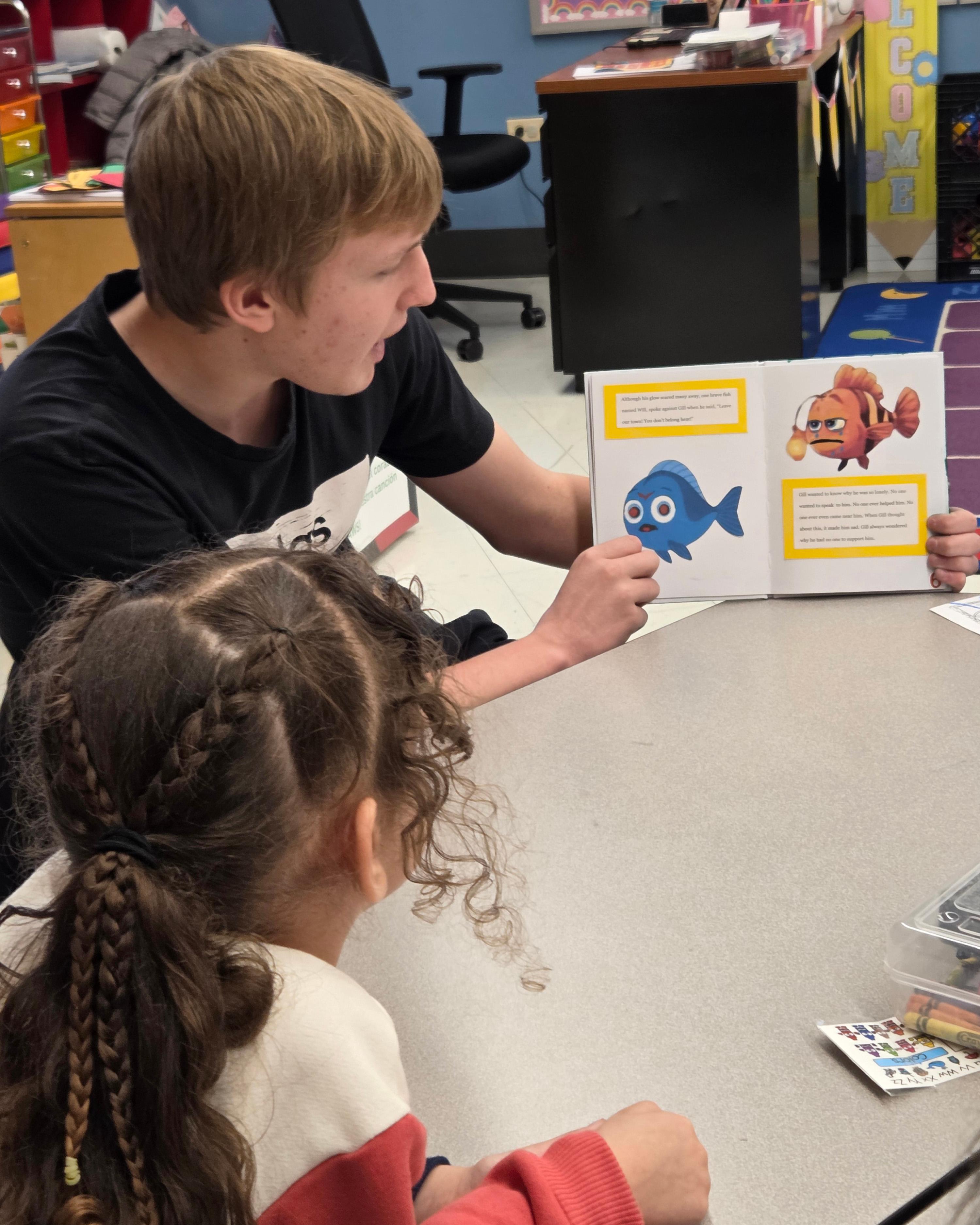 Addison Trail students share their children’s books with elementary school classes