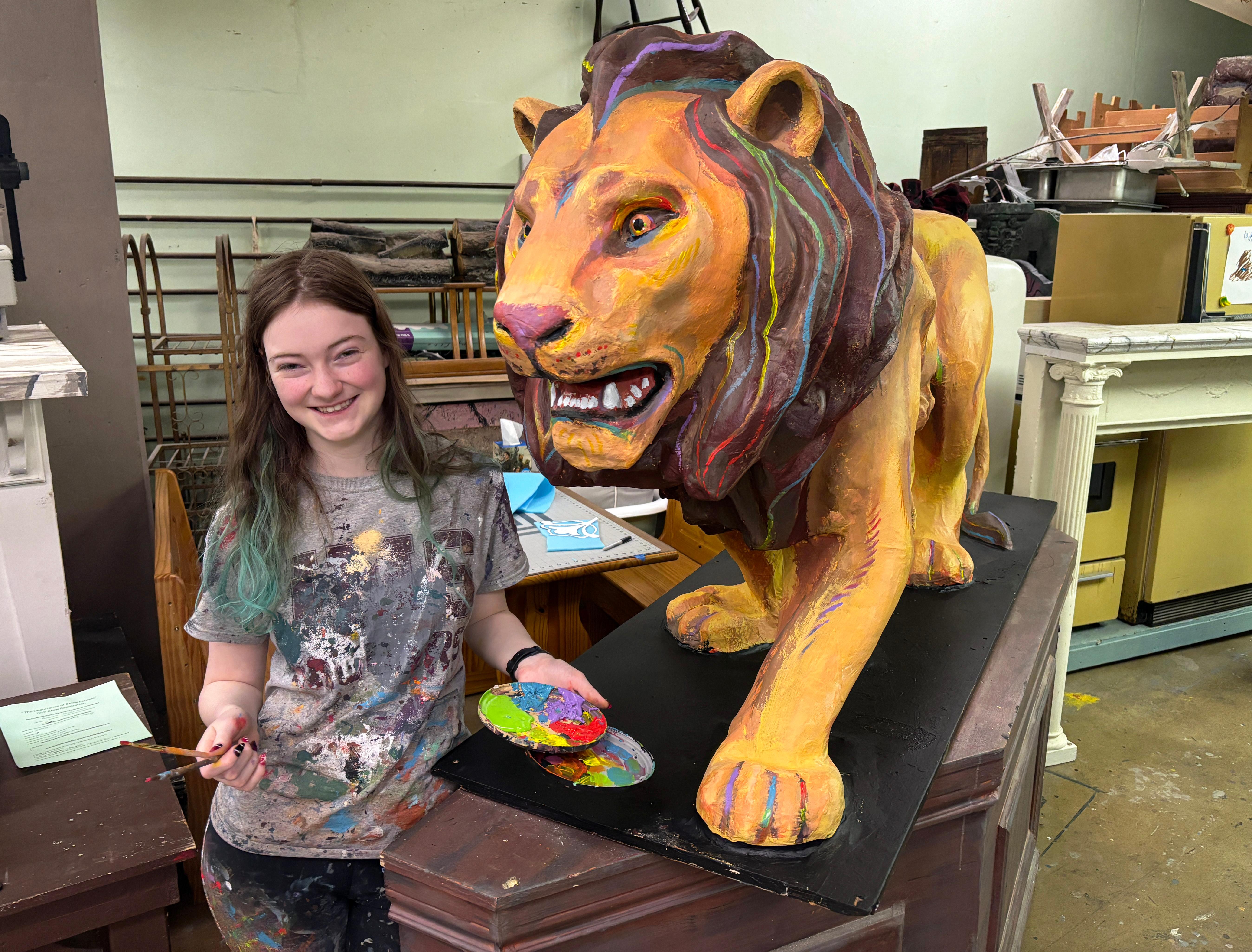 Members of Willowbrook’s theatre paint crew support Lion’s Club of Villa Park