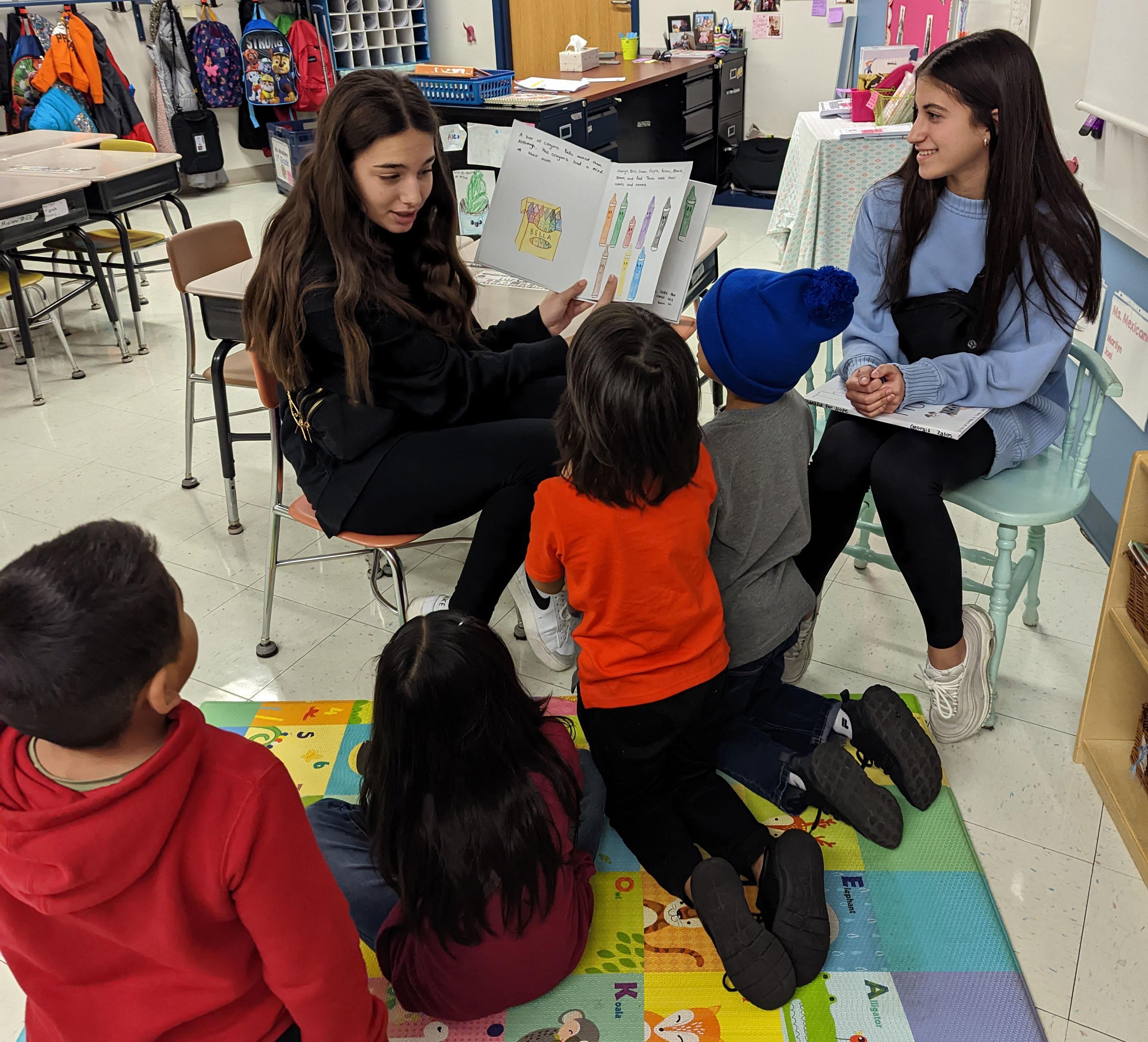 Addison Trail students share their children’s stories with local elementary schools