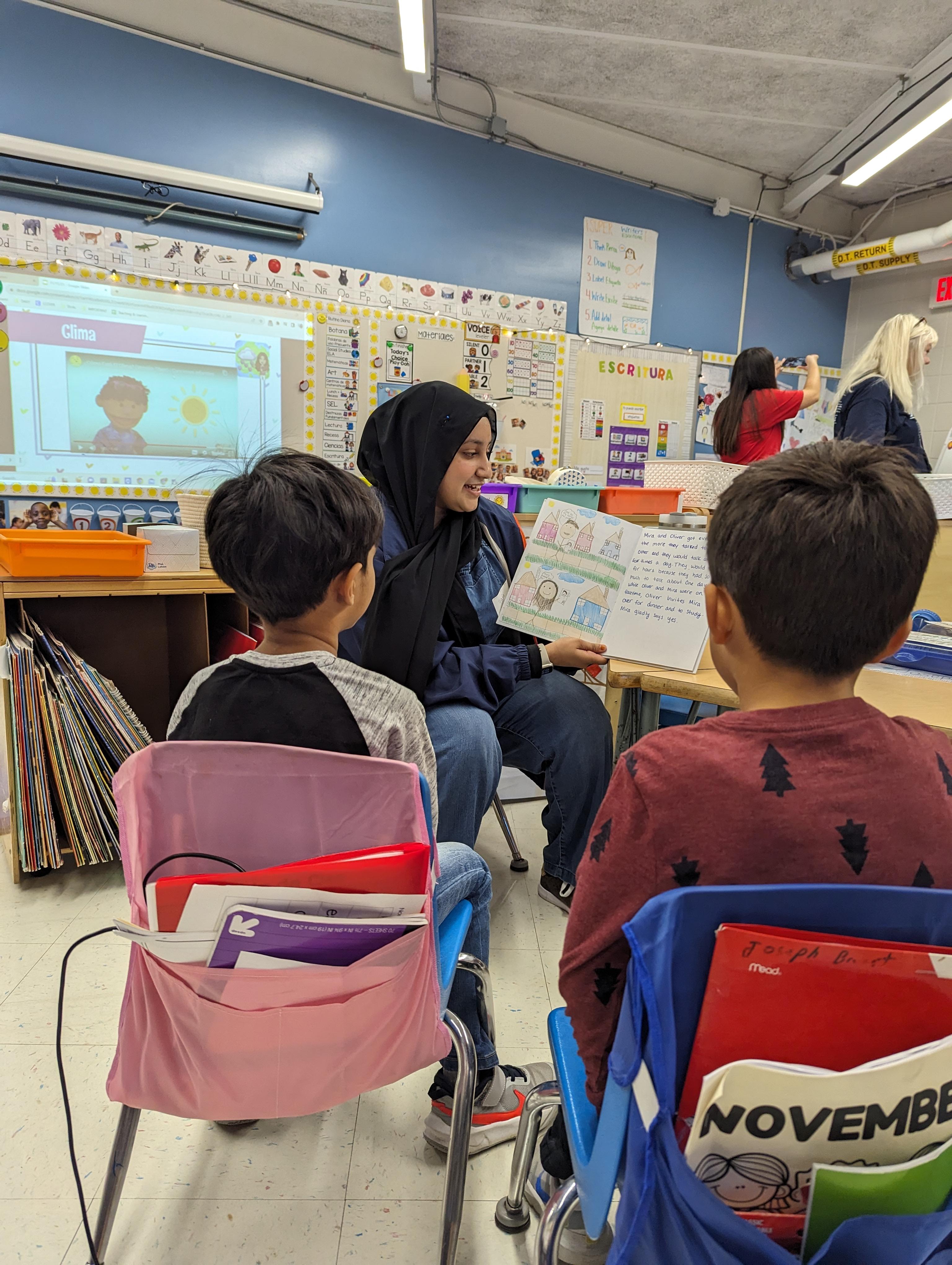 Addison Trail students share their children’s stories with local elementary schools